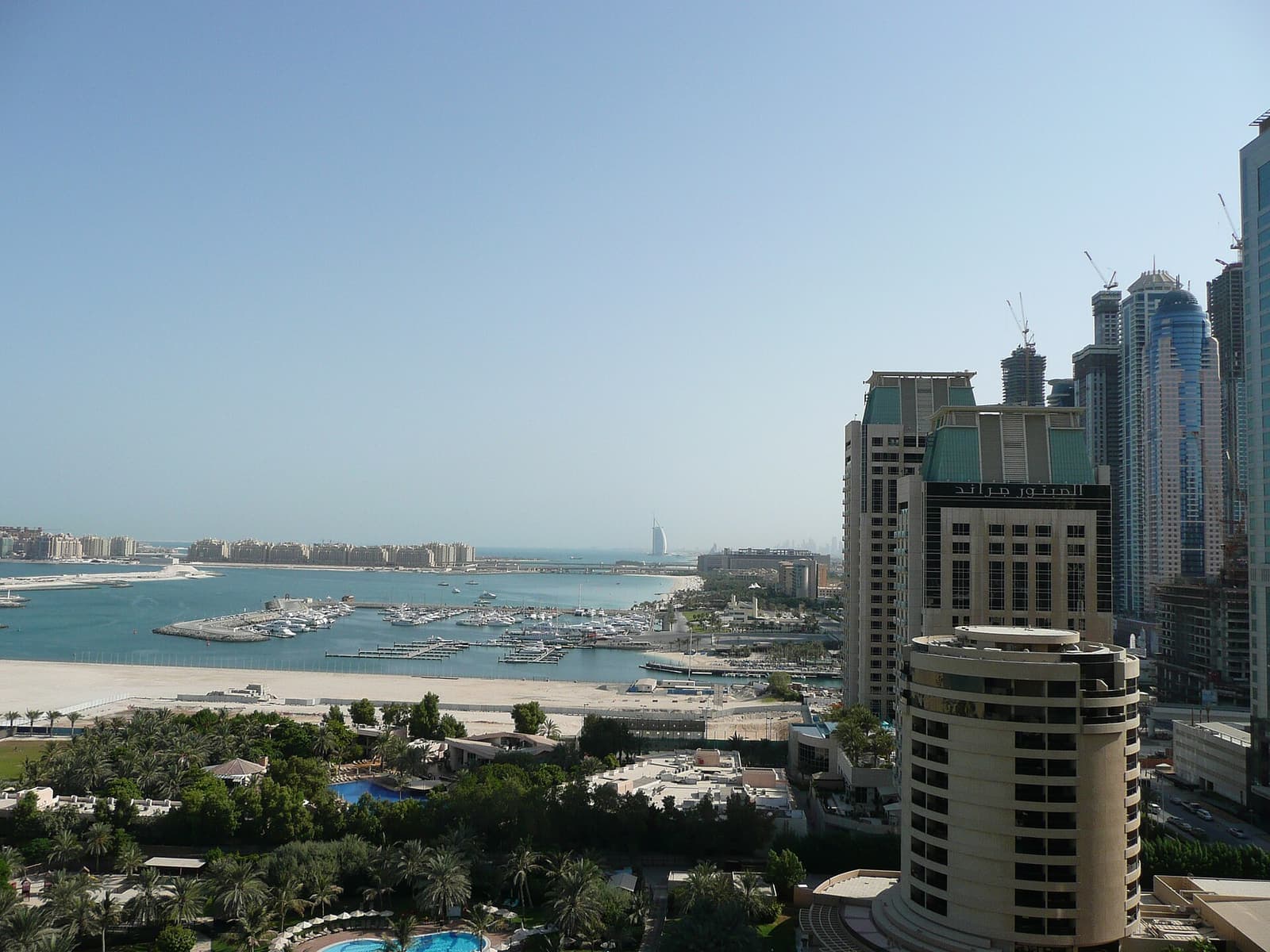 Dubai Marina towers and waterfront at golden hour