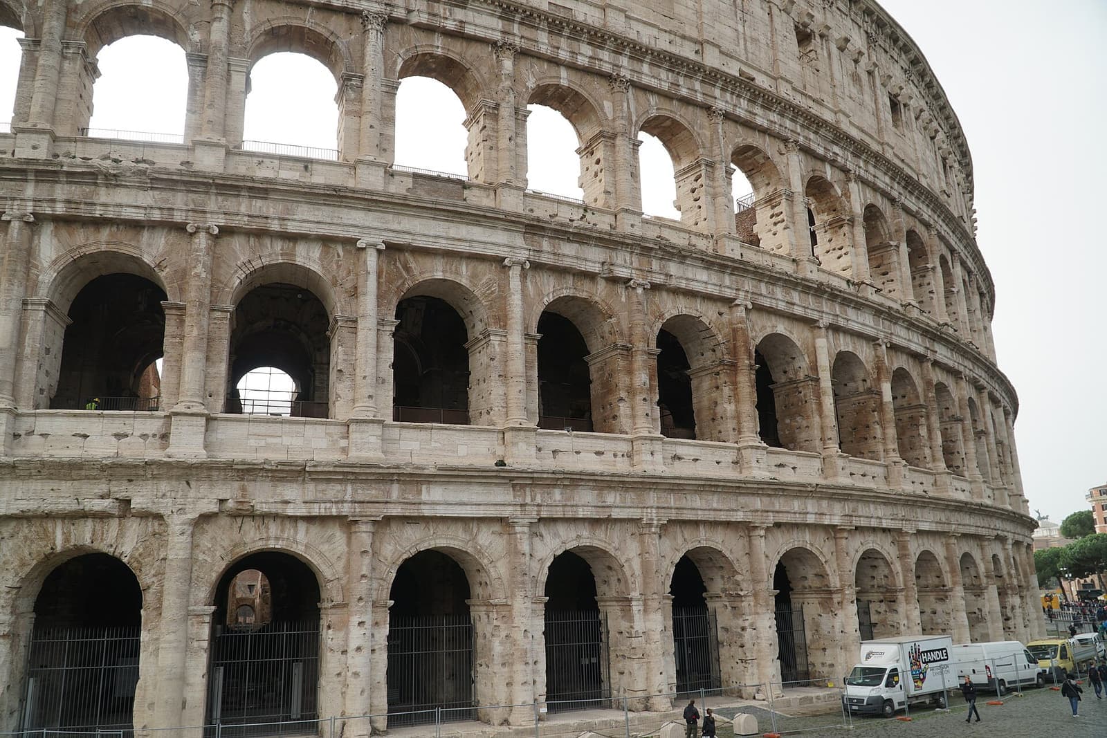 The Colosseum in Rome under a clear sky