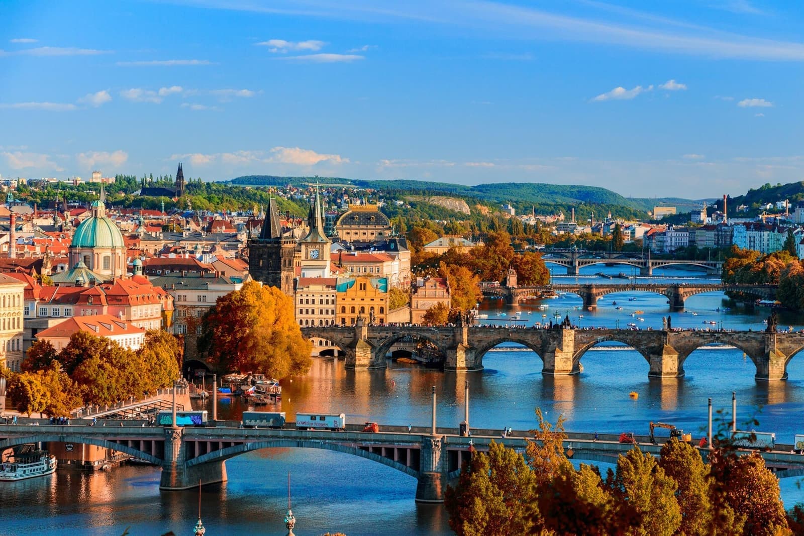 Bridges and historic rooftops across the Prague skyline