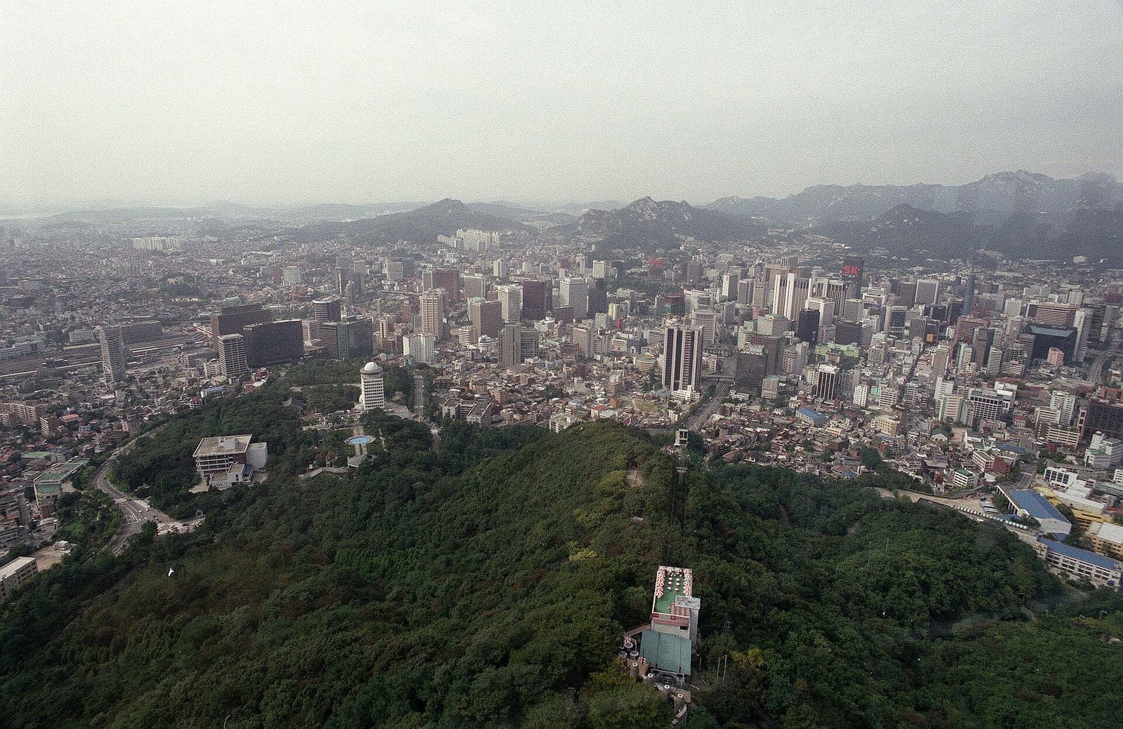 Seoul skyline with illuminated towers rising above the city